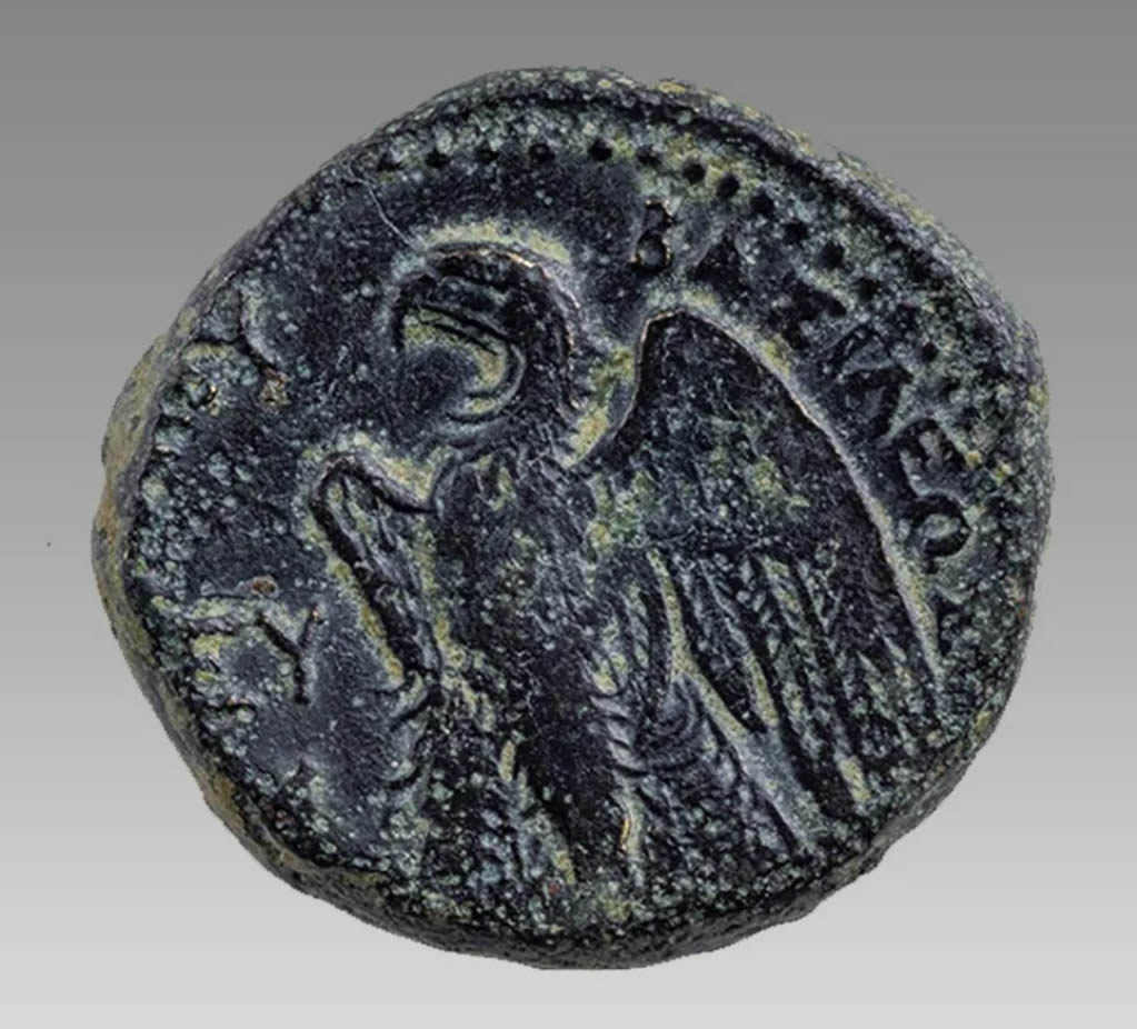 Ptolemy I 305 BC reverse PTOLEMAIOU BASILEWS eagle standing wings open symbols before